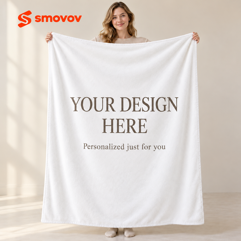 Woman holding a white smovov flannel blanket with Your Design Here personalization text.